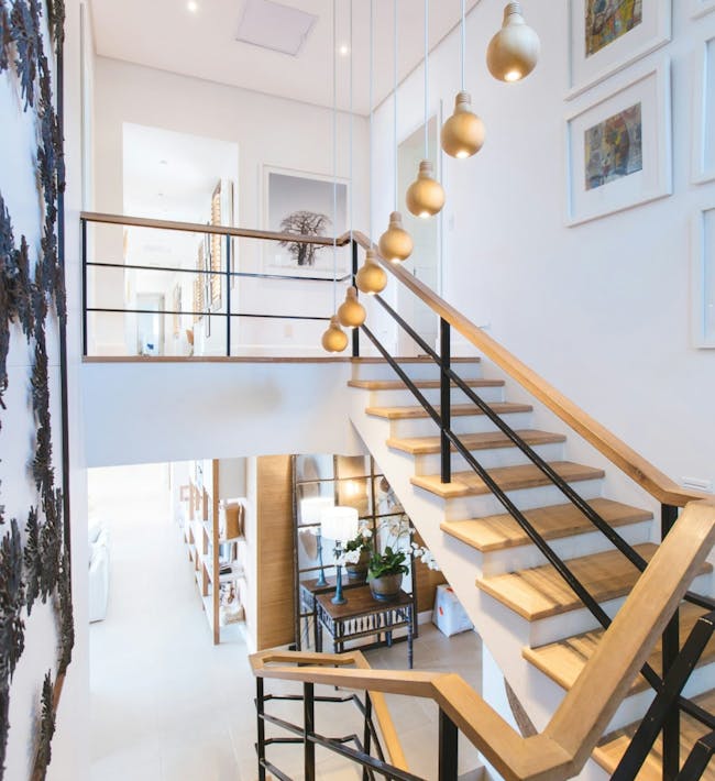 Stair case in commercial building with hanging lights